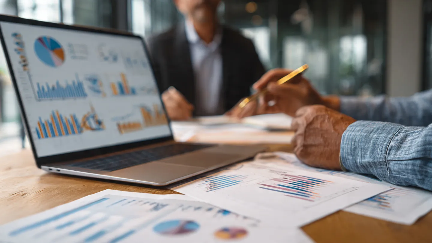 Executive reviewing charts to justify the need to outsource bookkeeping in Riyadh for his firm